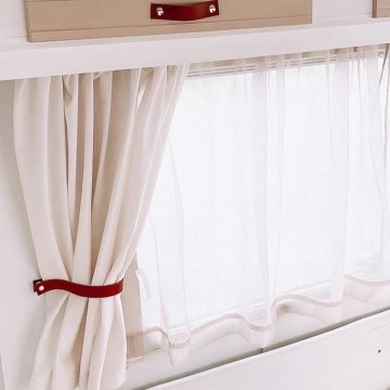 Gordijnhouder van leer